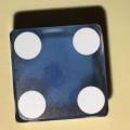 Blue D6 showing 4 pips